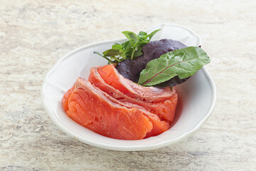 Sliced salmon fillet starter snack