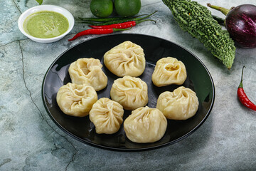 Nepali steamed dumplings  Momo with sause