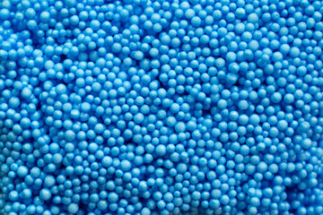 close up of blue foam beads for the background
