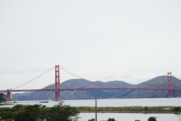 Fototapeta na wymiar Sunset view of Golden Gate Bridge in San Francisco, United States - アメリカ サンフランシスコ ゴールデンゲートブリッジ