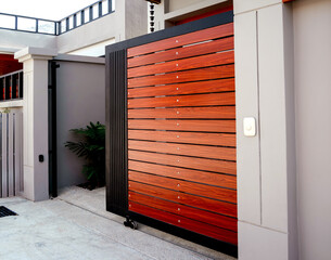 Automatic sliding front gate at modern villa