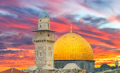 Dramatic sunrise above golden dome of Rock Mosque on Temple Mount in old city of Jerusalem, the image may be used for major Islamic holiday of Ramadan - 749788017
