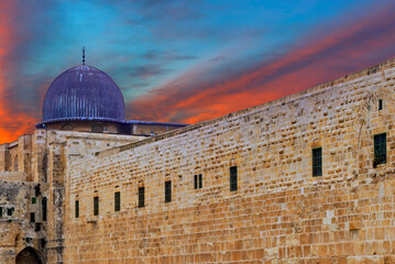 Dramatic sunrise above  ancient Al-Aqsa Mosque, the Mosque is  located in old city of Jerusalem and is the third holiest site of Islam in the Middle East - 749788065