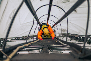 Worker crawling up the stairs