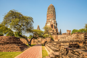 View at the ruins of Phra Ram Wat in the streets of Ayutthaya - Thailand - obrazy, fototapety, plakaty