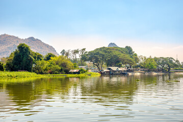 Views of nature and surroundings while sailing on the river Kwai in Thailand - 749815290