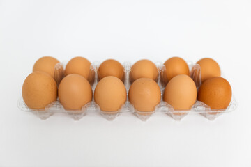 Large brown organic eggs on a white clear background. Food on a clear white background. Mockups. Layout.