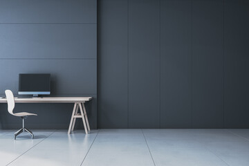 Contemporary minimalistic black interior with workplace and computer monitor, mock up place on wall. 3D Rendering.