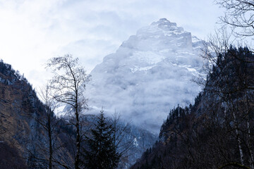 Mountain in the Swiss Alps, soft sweet morning clouds