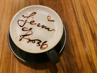 Glass of the milo or coffee. The inside is text 