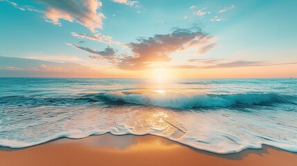 A golden sand beach faces a blue ocean, cloud cover, and a setting sun. - obrazy, fototapety, plakaty