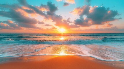 A golden sand beach faces a blue ocean, cloud cover, and a setting sun. - obrazy, fototapety, plakaty