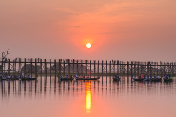 Sunset with silhouette of u bein bridge in Amarapura township, myanmar - 749843207