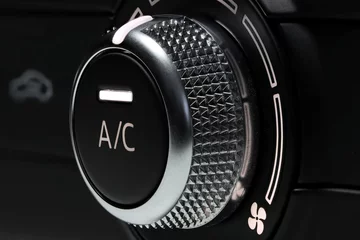 Fotobehang air condition control switch inside a car © Björn Wylezich