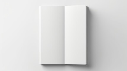 A realistic white book vector mockup showcases a top-down perspective, featuring a book lying on a surface with shadow, serving as a template for art, images, or text placement.