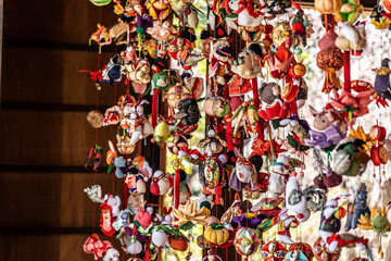 Fototapeta na wymiar Traditional Japanese hanging Hina dolls displayed in the Hundred Herb Garden_02