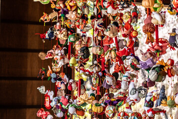 Fototapeta na wymiar Traditional Japanese hanging Hina dolls displayed in the Hundred Herb Garden_01