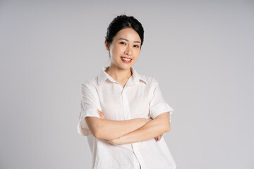 Portrait of beautiful asian woman posing on white background