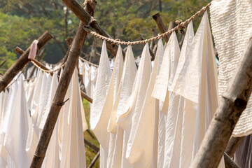 Cochin Laundry with washing lines of sheets and ironing rooms