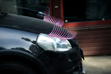 Cute car with pink eyelashes