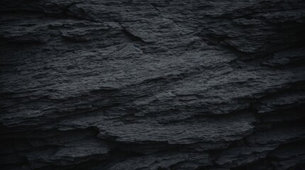 Textured black slate forms abstract rugged surface display 