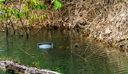 The TV is floating in the water