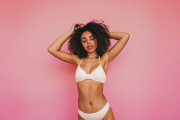 Fashionable black woman wear white bra and posing - Powered by Adobe