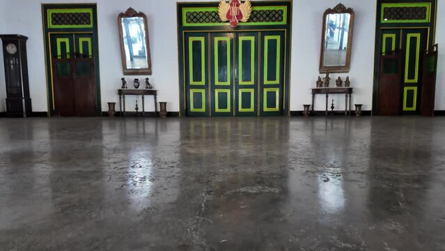 Large hall for meetings or ceremony ritual or performance with smooth cement flooring in a traditional jogja javanese buildings.