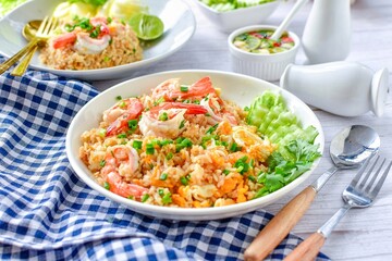 Fried rice with shrimps on  white plate
