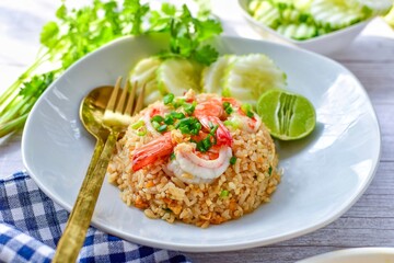 Fried rice with shrimps on  white plate