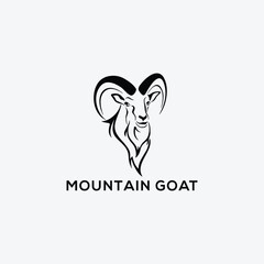 White Goat On The Mountain Logo Design. Goat standing proudly on the top of the mountain Logo Design