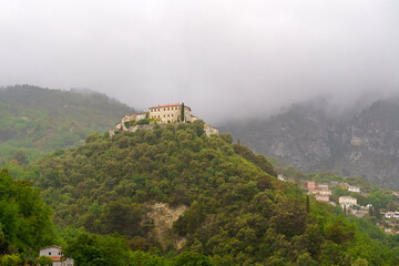 A castle perched on a verdant hill