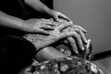 Hands of young and old