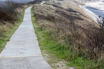 Foto auf Alu-Dibond Nordsee, Niederlande wide path high above the dunes on the north sea Zeeland Netherlands