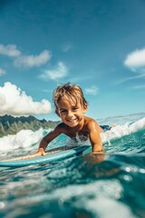 A happy boy learning to surf