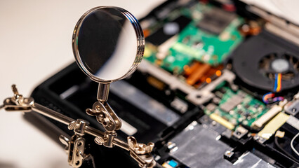 The soldering iron and the chip are on the master's desk