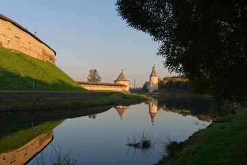  Pskov, Russia, September 11, 2023. View of the wall towers from the park at dawn.                              