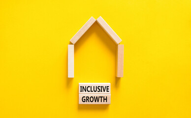 Fototapeta na wymiar Inclusive growth symbol. Concept words Inclusive growth on beautiful wooden blocks. Beautiful yellow table yellow background. House model. Business inclusive growth concept. Copy space.