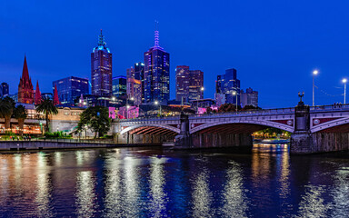 Melbourne city skyline with Princes Bridge at night