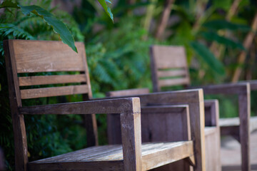 Fototapeta na wymiar Chair in garden amidst nature