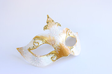 Photo of elegant and delicate Venetian mask isolated on white background