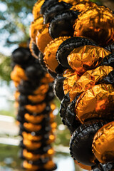 Gold and black foil balloons formed the entrance. 