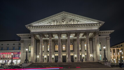 Obraz premium Munich National Theatre on the Max Joseph square night timelapse hyperlapse. Germany