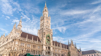 Marienplazt Old Town Square with Town Hall Clock Tower Glockenspiel timelapse.