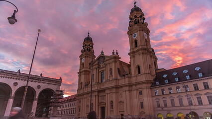 Fototapeta premium The Theatine Church of St. Cajetan timelapse during sunset. Munich, Germany