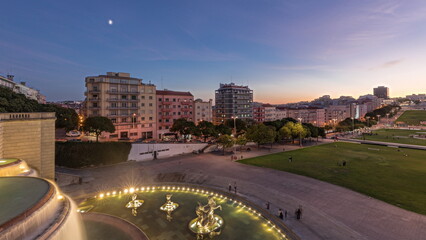 Panorama showing lawn at Alameda Dom Afonso Henriques and the Luminous Fountain aerial day to night...