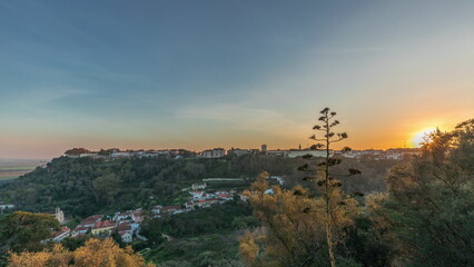 Panorama showing sunset over the Castle of Almourol on hill in Santarem aerial timelapse. Portugal