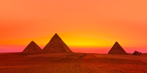 Giza Pyramid Complex at amazing sunset sky - Cairo, Egypt