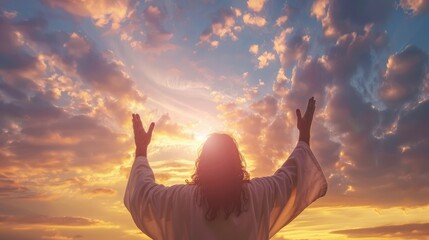 Jesus Christ raised hands and praying to god with a sunrise sky background