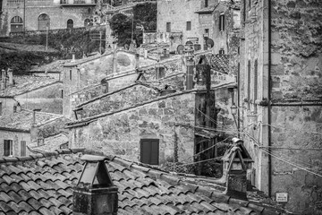 Black and white detailed old town country cityscape, Sorano, Tuscany, Italy, stone houses and beautiful picturesque roofs